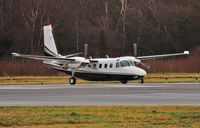 M-BETS @ EGHH - Entering 26 to depart Cega. - by John Coates