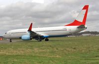 G-GDFP @ EGHH - Arriving still in basic Austrian colours for repaint to Jet 2 - by John Coates