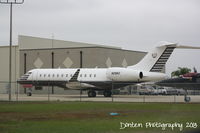 N288ZZ @ KSRQ - Bombardier Global Express (N288Z) sits on the ramp at Sarasota-Bradenton International Airport - by Donten Photography