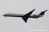 N915DE @ KSRQ - Delta Flight 1072 (N915DE) on approach to Sarasota-Bradenton International Airport following a flight from Detroit Metro-Wayne County Airport - by Donten Photography