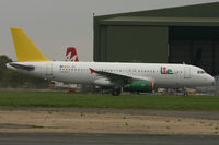 EC-JRX @ EGHH - LTE.es, outside BASCOs with CL.44 9G-LCA behind. Inside the hangar is one of the short-lived flyBe 737s. 6000th aircraft photo on Airport-Data.com. - by Howard J Curtis