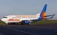G-GDFK @ EGSH - Being pulled past stand 6 in some lovely winter sun , Now with winglets fitted....