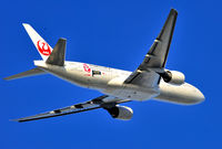 JA8978 @ RJTT - JAL's 2014 Winter Olympics Team - by JPC