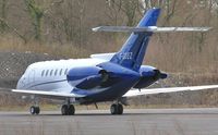 G-GDEZ @ EGHH - On the apron at JETS - by John Coates