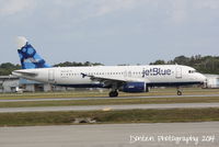 N665JB @ KSRQ - JetBlue Flight 163 (N665JB) Something About Blue arrives at Sarasota-Bradenton International Airport following a flight from John F Kennedy International Airport - by Donten Photography