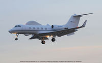 N510AG @ BWI - Landing at a cloudy sunset. - by J.G. Handelman
