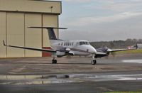 M-WATJ @ EGHH - Parking up at Signatures - by John Coates