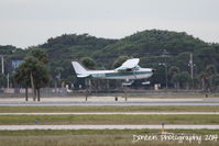 N61801 @ KSRQ - Cessna Skyhawk (N61801) arrives at Sarasota-Bradenton International Airport - by Donten Photography
