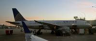 N426UA @ KORD - Gate C25 ORD - by Ronald Barker