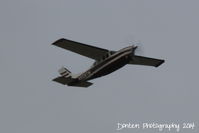 N508TM @ KSRQ - Cessna Centurion (N508TM) departs Sarasota-Bradenton International Airport enroute to Charleston International Airport - by Donten Photography
