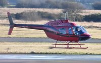G-TGRZ @ EGFH - Visiting Jet Ranger III operated by Tiger Helicopters. - by Roger Winser
