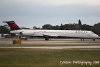 N986DL @ KSRQ - Delta Flight 2068 (N986DL) taxis at Sarasota-Bradenton International Airport - by Donten Photography