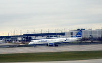 N374JB @ KORD - Taxi ORD - by Ronald Barker