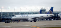 N493UA @ KORD - Taxi ORD - by Ronald Barker