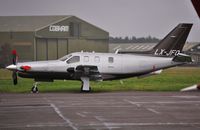 LX-JFO @ EGHH - Parked at Pilatus centre - by John Coates