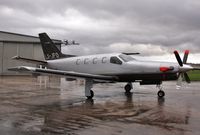 LX-JFO @ EGHH - Sat in the rain at Pilatus Centre - by John Coates