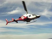 N277LF @ ID91 - While in service for Saint Alphonsus-Life Flight.  Life Flight 77 landing on the roof at SARMC in Boise, ID USA. - by Eric Kincaid