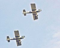 G-VFDS @ EGFH - G-VFDS leading G-EGRV in formation over runway 04. - by Derek Flewin