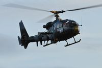 ZB665 @ EGFH - Army Air Corps helicopter droping in for fuel. - by Roger Winser