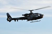 ZB665 @ EGFH - Army Air Corps helicopter droping in for fuel. - by Roger Winser