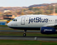 N561JB @ KDCA - La Vie en Blue taking off at National - by Ronald Barker