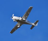 N583CD @ EGFH - Visiting SR22 on missed approach. - by Roger Winser