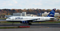 N657JB @ KDCA - Denim Blue landing roll National - by Ronald Barker