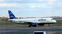 N657JB @ KDCA - Denim Blue Taxi National - by Ronald Barker