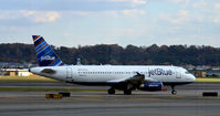 N657JB @ KDCA - Denim Blue taxi to park National - by Ronald Barker