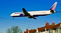 EI-UNP @ LHR - TPAHCADPO Airlines, (EI-UNP) Boeing 777-312, c/n 28516, on approach to land on 27L Heathrow. © PhilRHama - by Phil R Hamar