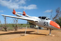 A79-651 @ N.A. - Vampire T35 along the main road through the town of Beverley, Western Australia. It is in fact a composite, made from various airframes and has been crudely assembled and finished. - by Henk van Capelle