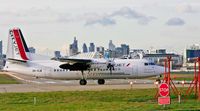 OO-VLM @ EGLC - CityJet, (OO-VLM) 1988 Fokker 50, c/n: 20135, pushing to take off on 27 (LCY) © PhilRHamar - by Phil R Hamar