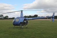 G-BSCE @ EGBR - Robinson R22 Beta at The Real Aeroplane Club's Helicopter Fly-In, Breighton Airfield, September 2013. - by Malcolm Clarke