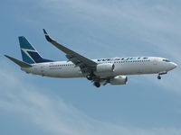 C-GWWJ @ CYYZ - This 2008 Westjet 737 prepares to land on rwy 24R at Toronto Int'l Airport