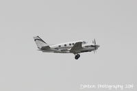 N969LD @ KSRQ - King Air 90 (N969LD) departs Sarasota-Bradenton International Airport enroute to Salisbury Airport - by Donten Photography