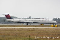 N915DE @ KSRQ - Delta Flight 2298 (N915DE) arrives at Sarasota-Bradenton International Airport following a flight from Hartsfield-Jackson Atlanta International Airport - by Donten Photography