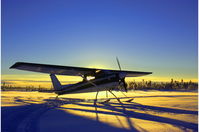 N704JB - 1975 C-150 / 150 on Areo Ski M3000's - by Terry Godes