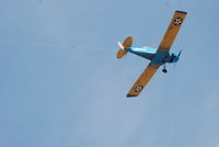 N5558P @ KDAN - 1984 Tierra 11 over KDAN pulling a banner. - by Richard T Davis