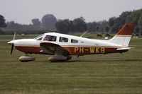 PH-WKB @ EHHV - Rolling on the grass towards the active runway on Hilversum Airfield - by Marc Heesters