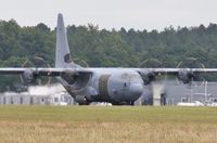 ZH888 @ EGHH - Departing 26 in the haze - by John Coates