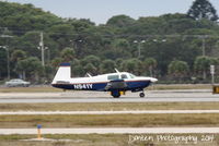N941Y @ KSRQ - Mooney M-20 (N941Y) arrives at Sarasota-Bradenton International Airport - by Donten Photography