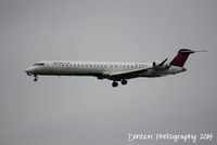 N930XJ @ KSRQ - Delta Flight 3493 operated by Endeavor (N930XJ) arrives at Sarasota-Bradenton International Airport following a flight from LaGuardia Airport - by Donten Photography