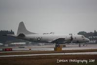 158927 @ KSRQ - A P-3 Orion from the VP-26 “Tridents” squadron at Naval Air Station Jacksonville performs maneuvers at Sarasota-Bradenton International Airport - by Donten Photography