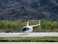 N4512G @ SZP - 2010 Robinson R66, one Rolls Royce 250-C300/A1 Turboshaft derated to 270 shp for takeoff, 224 shp max continuous, main rotor 404-412 rpm, 3rd prototype, Experimental class R&D, warmup on SZP helipad - by Doug Robertson