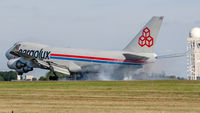 LX-FCV @ ELLX - smoky touchdown at Luxembourg - by Friedrich Becker