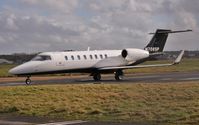N708SP @ EGHH - Taxiing home to Jetworks - by John Coates