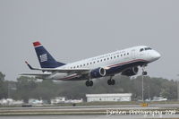 N827MD @ KSRQ - US Air Flight 3404 operated by Republic (N827MD) departs Sarasota-Bradenton International Airport - by Donten Photography