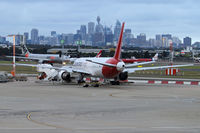 VH-EFR @ YSSY - WAITING - by Bill Mallinson