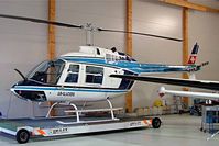 HB-XHO @ LSGC - HB-XHO   Agusta-Bell 206A Jet Ranger [8155] (Air-Glaciers) La Chaux-de-Fonds~HB 09/04/2009