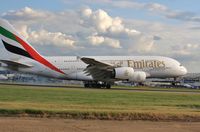 A6-EDH @ EGLL - Evening arrival 27R - by John Coates